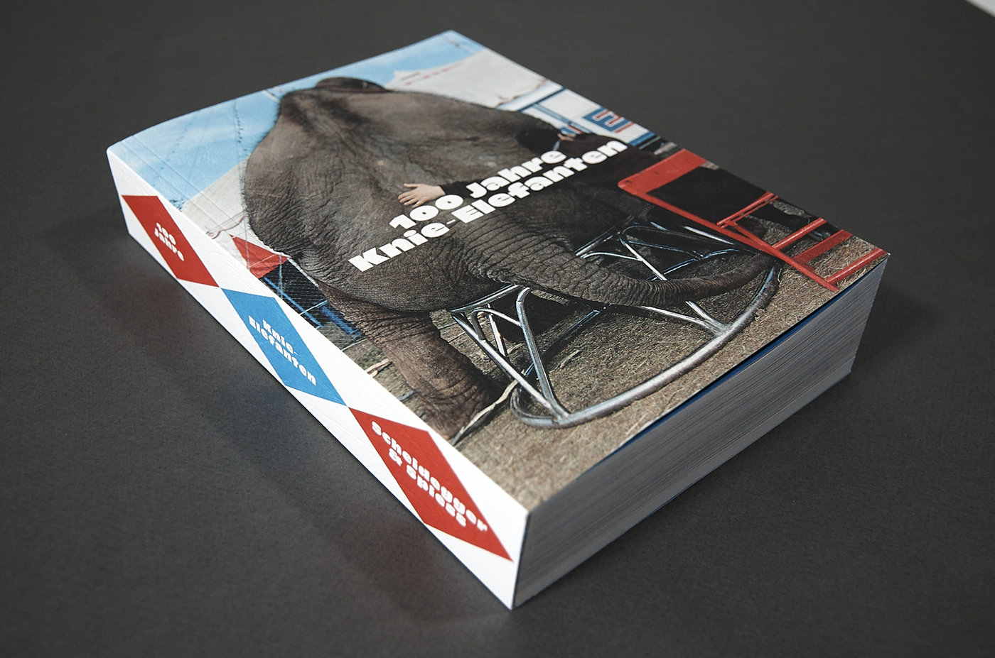 Perfect-bound book with elephant cover illustration 100 Jahre Knie-Elefanten