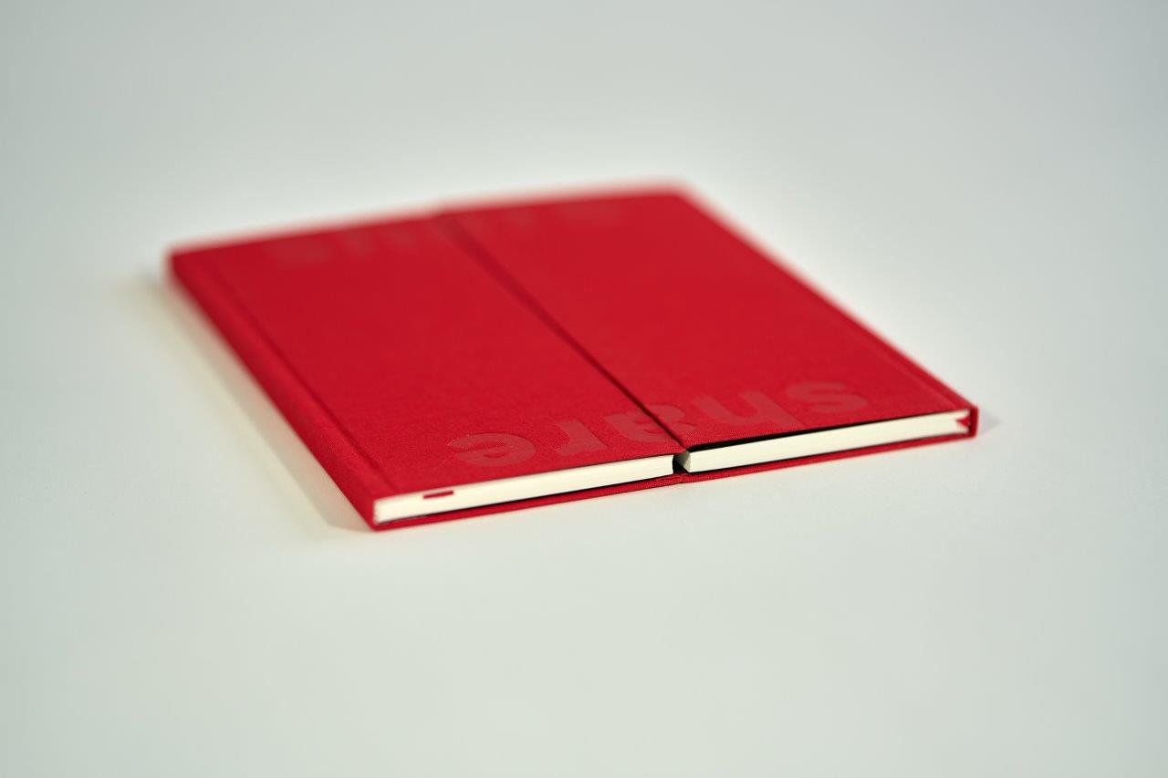 Red hardcover book with dust jacket BNB 2019 - The Sharing Book
